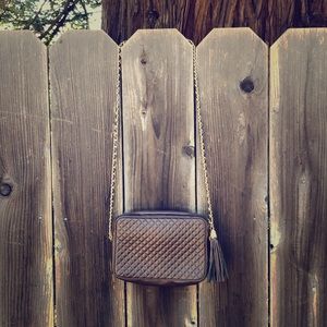 Brown pleather purse with gold chain and tassel